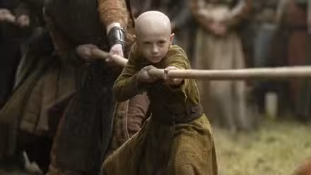Dexter Sol Ansell as Egg tugging on a rope in a tug-o-war in A Knight of the Seven Kingdoms Season 1