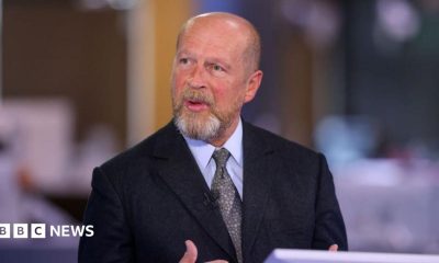 James Reed, chairman of Reed Executive Ltd., during a Bloomberg Television interview in London, UK in 2023. He is wearing a black suit jacket, a light coloured shirt with a grey and beige patterned tie.