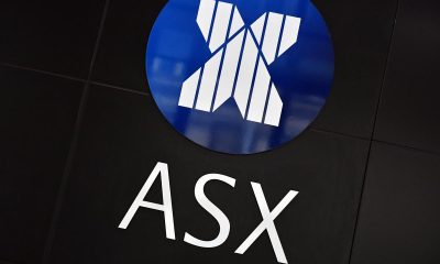 Aussie shares edge lower as WiseTech leads IT sell-off