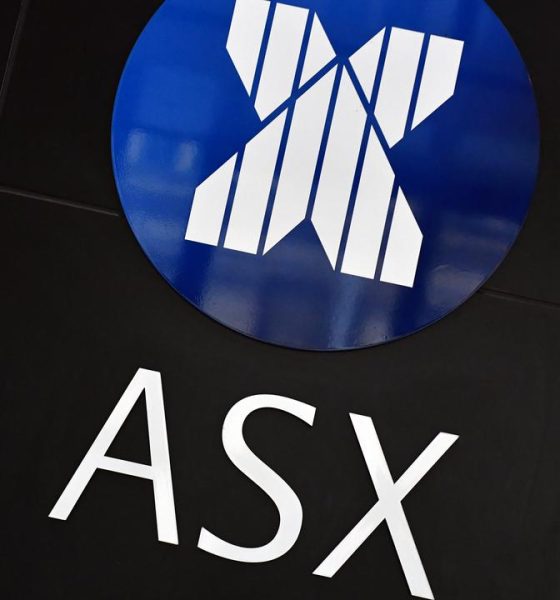Aussie shares edge lower as WiseTech leads IT sell-off