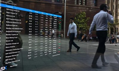 Australian shares dip as slump in miners drags on