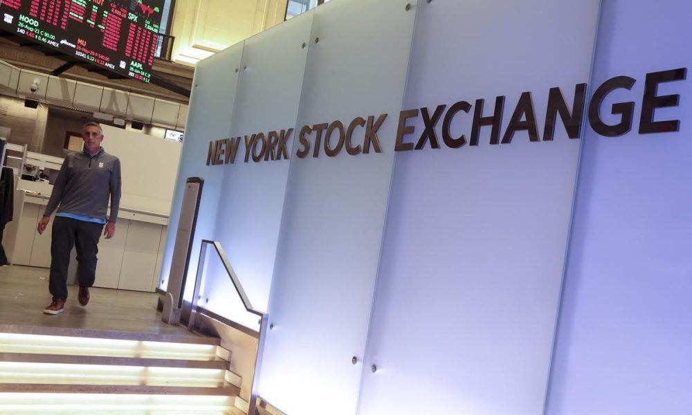 Wall Street ends lower as AI spending concerns mount