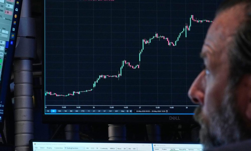 Wall St ends higher as SpaceX's market debut dominates