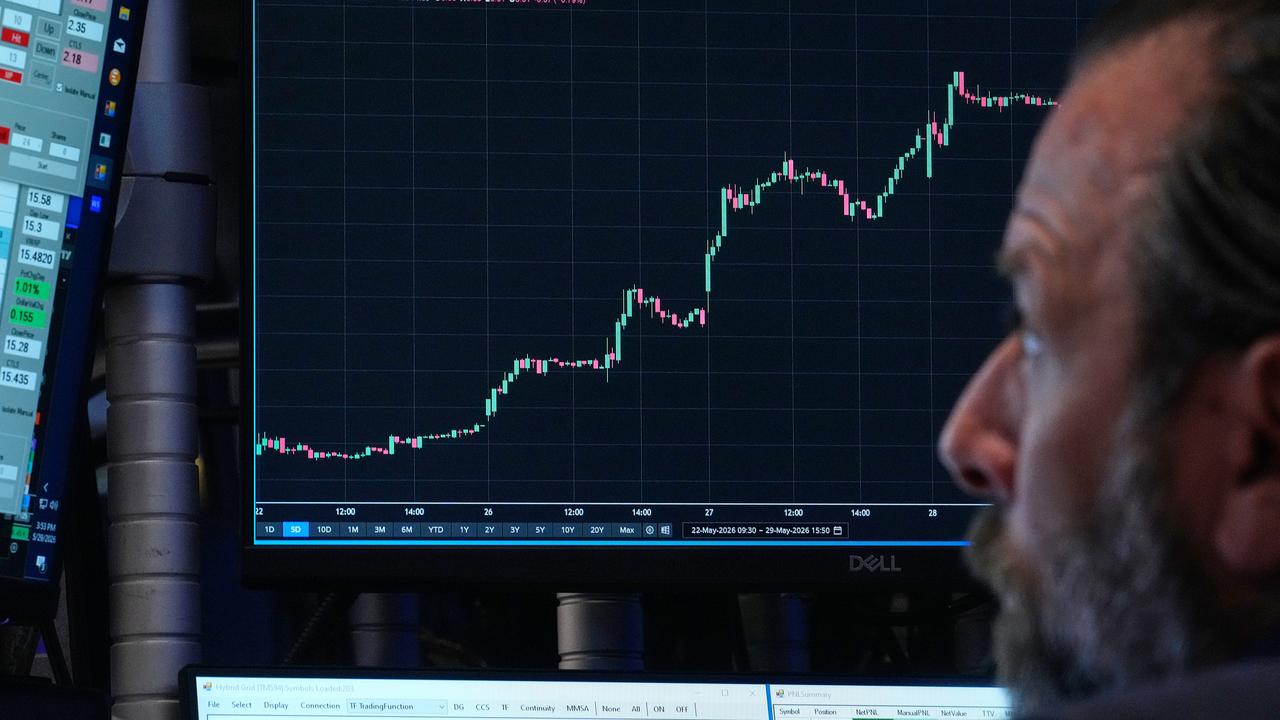 Wall St ends higher as SpaceX's market debut dominates