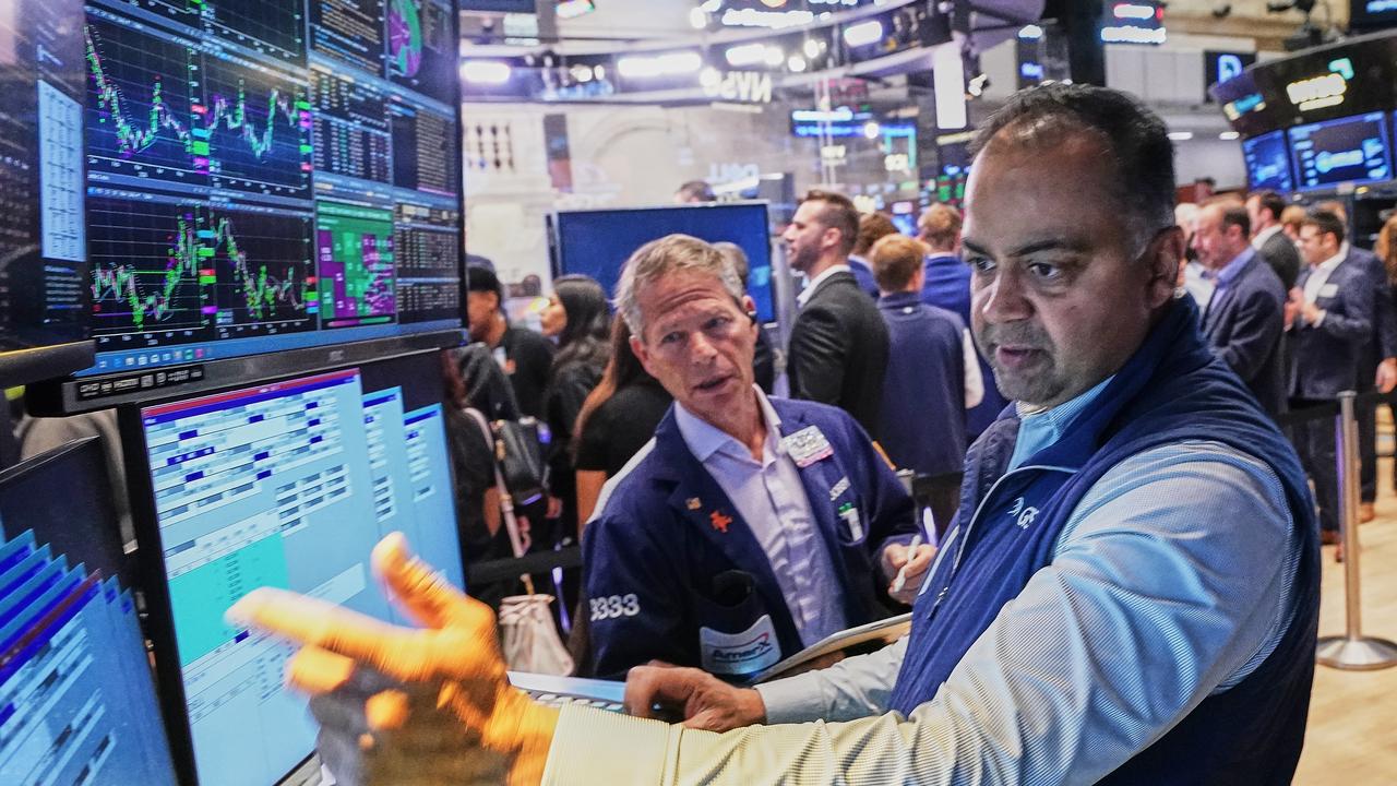 Wall Street ends mixed as investors focus on Iran talks
