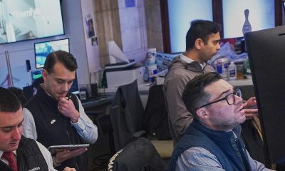 Wall Street ends mixed as shares in tech firms fall