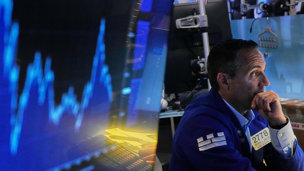 Wall Street ends lower as shares of chip firms tumble