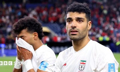 Ramin Rezaeian and Mehdi Taremi of Iran deflated after draw with Egypt at 2026 World Cup