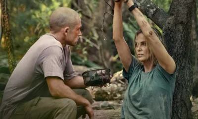 Taron Egerton as Ben and Charlize Theron as Sasha in Apex