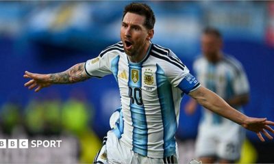 Lionel Messi celebrating scoring for Argentina