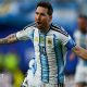 Lionel Messi celebrating scoring for Argentina