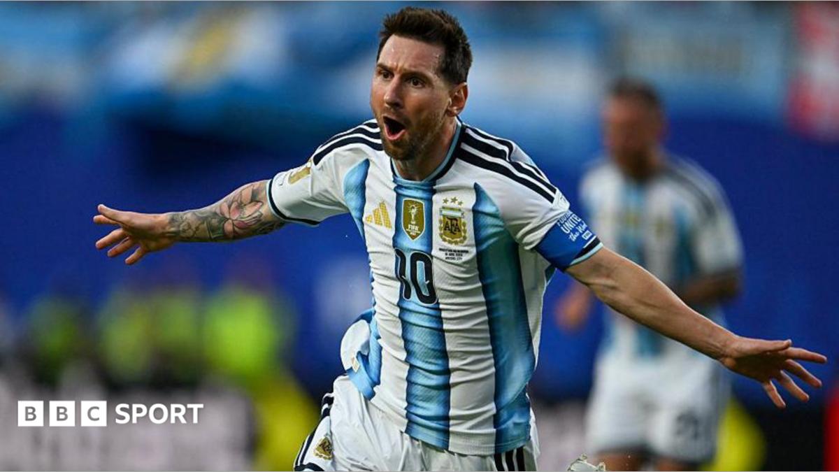 Lionel Messi celebrating scoring for Argentina
