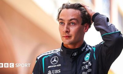 George Russell runs his hand through his hair and looks disappointed following Monaco Grand Prix qualifying