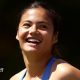 Emma Raducanu smiles after completing her opening victory at Queen's