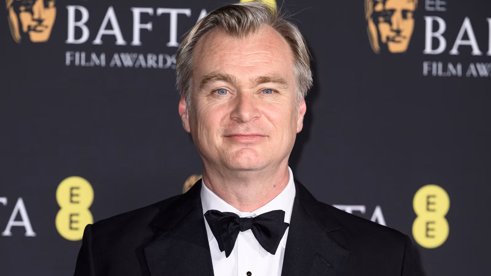 Christopher Nolan on the red carpet at the BAFTAs