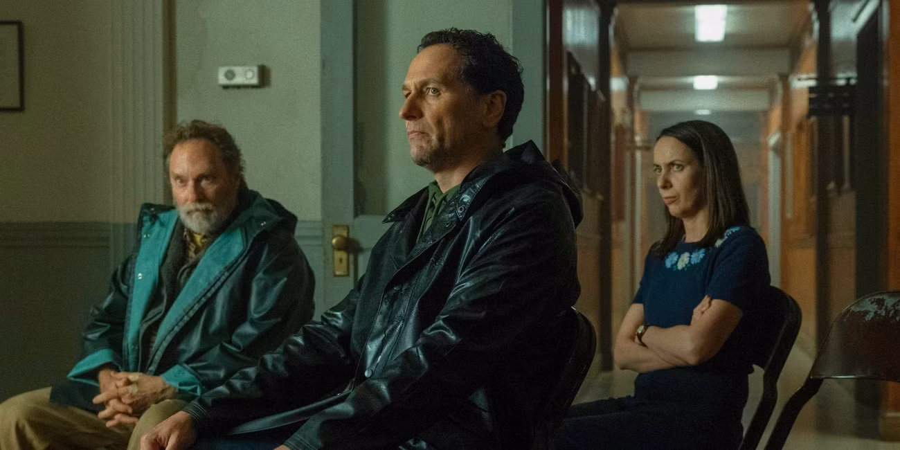 Matthew Rhys as Tom, Stephen Root as Wyck, and Kate O'Flynn as Patricia sitting together in Widow's Bay