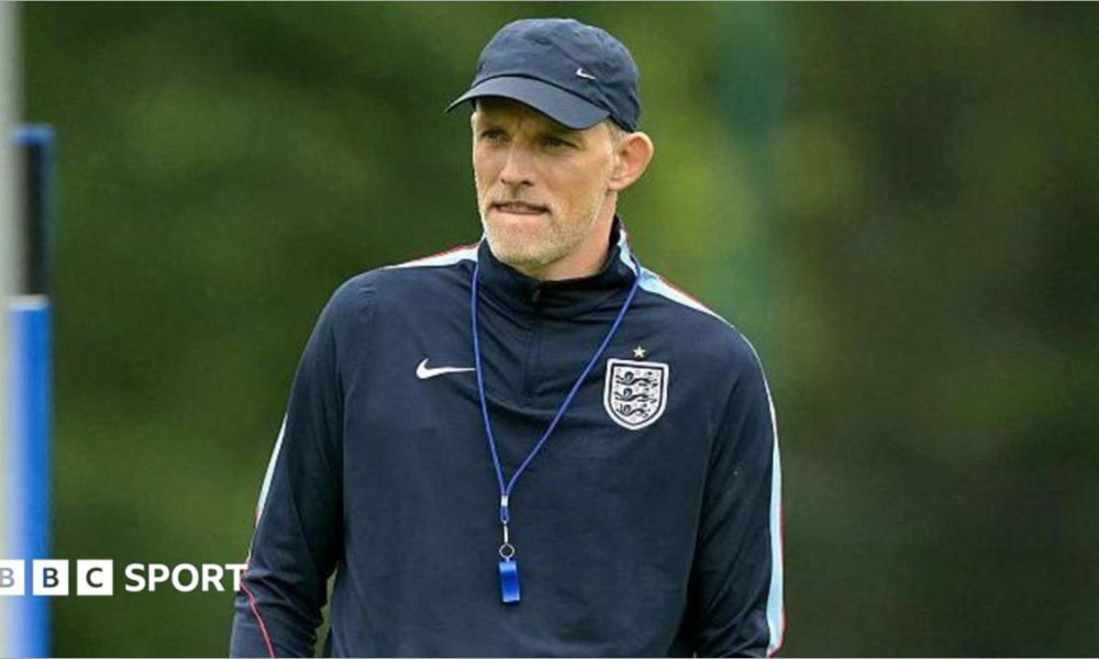 Thomas Tuchel wearing a baseball cap and England branded top during a training session at the World Cup