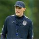 Thomas Tuchel wearing a baseball cap and England branded top during a training session at the World Cup