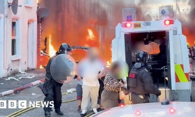 Residents flee as cars and houses burn in Belfast