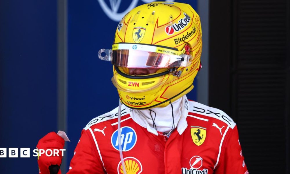 Ferrari's Lewis Hamilton clenches his fist in celebration after winning the Barcelona-Catalunya Grand Prix