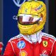Ferrari's Lewis Hamilton clenches his fist in celebration after winning the Barcelona-Catalunya Grand Prix