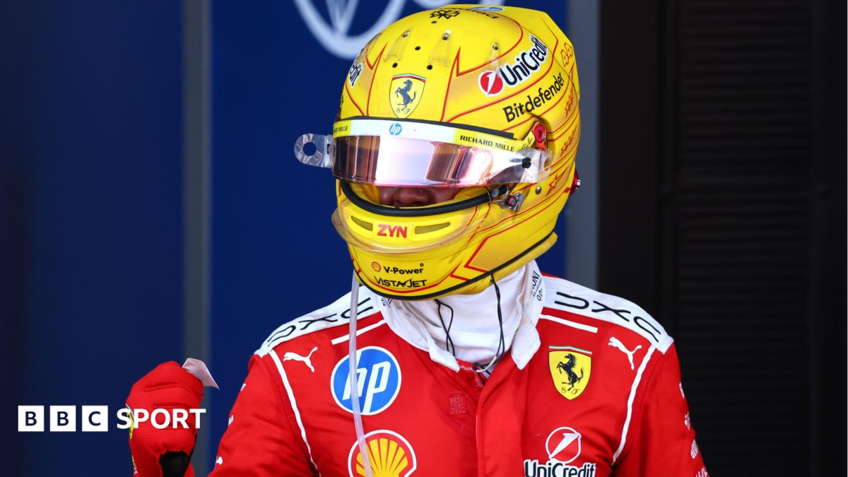 Ferrari's Lewis Hamilton clenches his fist in celebration after winning the Barcelona-Catalunya Grand Prix