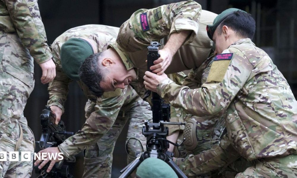 Members of the Royal Marines Reserve assemble a 50 calibre Heavy Machine Gun (HMG) before the first ever Lady Mayor's Show in the City of London, in November 2025