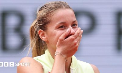 Polish qualifier Maja Chwalinska covers her mouth with her hand after completing victory over Anna Kalinskaya