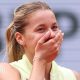 Polish qualifier Maja Chwalinska covers her mouth with her hand after completing victory over Anna Kalinskaya