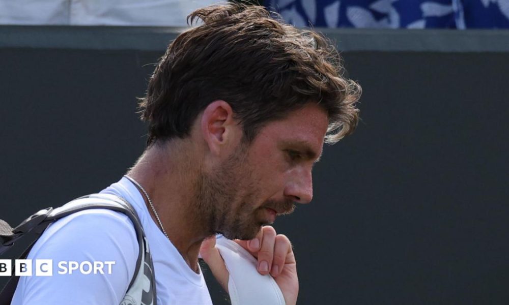 Cameron Norrie trudges off court at Wimbledon