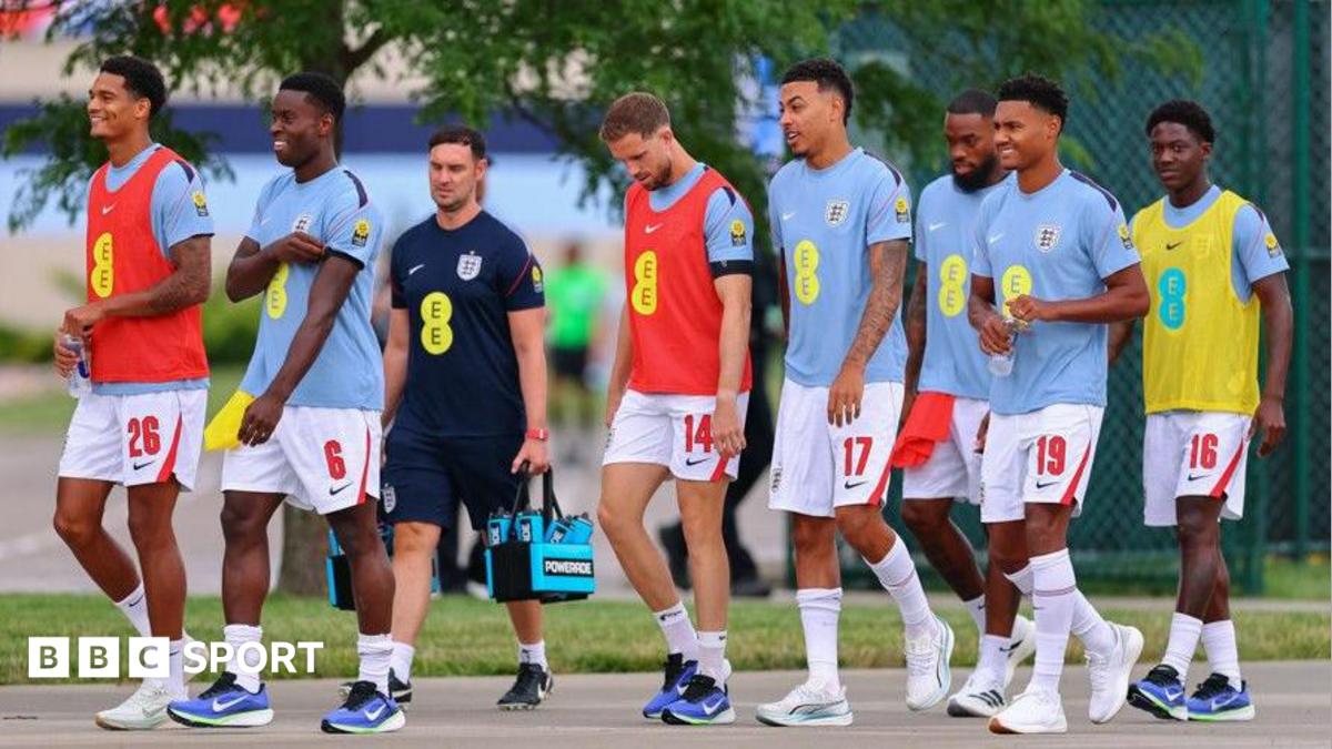 England players head to the pitch to warm up before a friendly against Sporting Kansas City