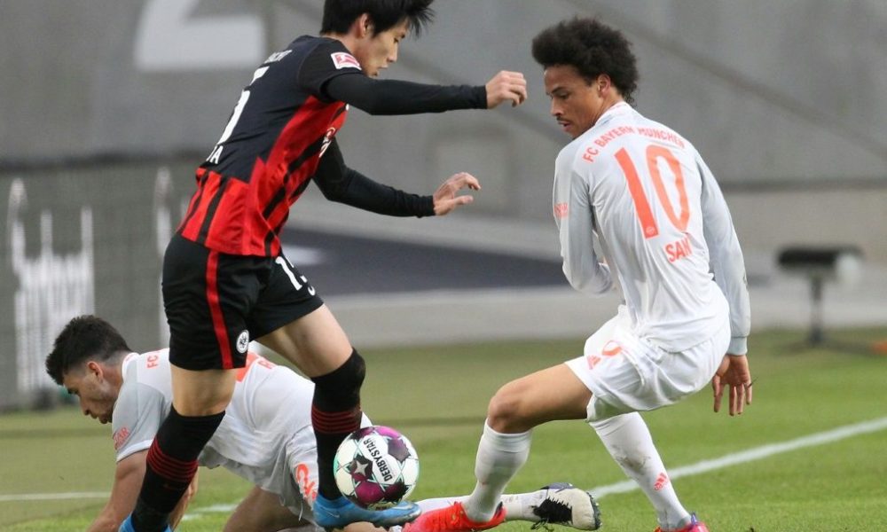 Frankfurt's Japan midfielder Daichi Kamada (L) scored the opening goal against Bayern Munich on Saturday