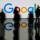 Google logo and employees seen.