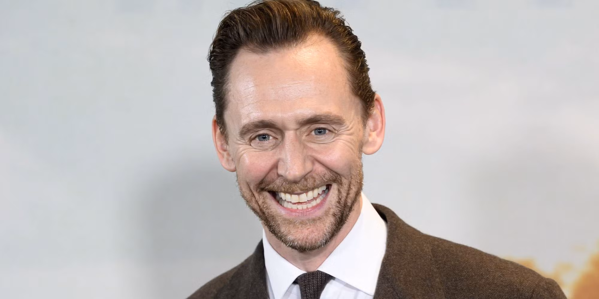 Tom Hiddleston's Epic New 3-Part History Drama Kicks Off With an Explosive Trailer