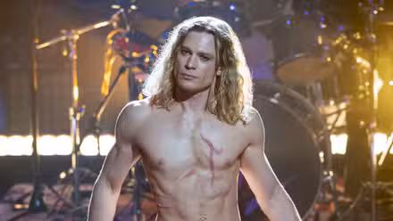 Sam Reid standing on stage shirtless in The Vampire Lestat