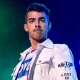 Joe Jonas Jokes He Needed 'Therapy' After Pooping Himself in White Pants Mid-Show