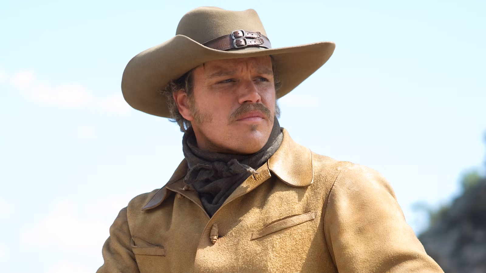 Matt Damon as Texas Ranger LaBoeuf looking to the distance in the film True Grit