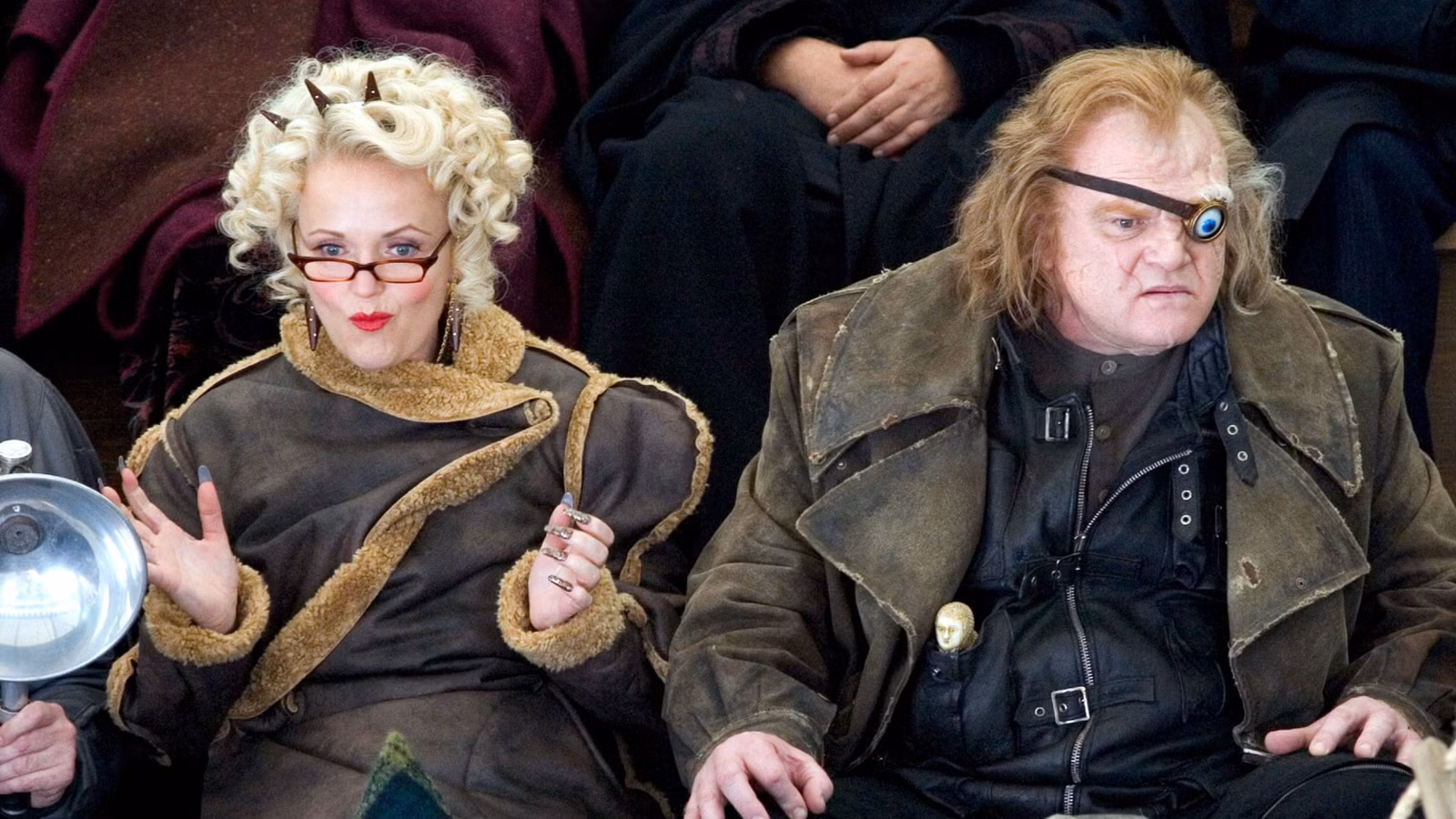 Rita Skeeter and Mad-Eye Moody sit in the crowd in Harry Potter