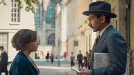 Mia McKenna-Bruce and Nabhaan Rizwan face each other on a street in Agatha Christie's Seven Dials.