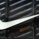 The Nike swoosh logo is seen outside the store on 5th Avenue in New York