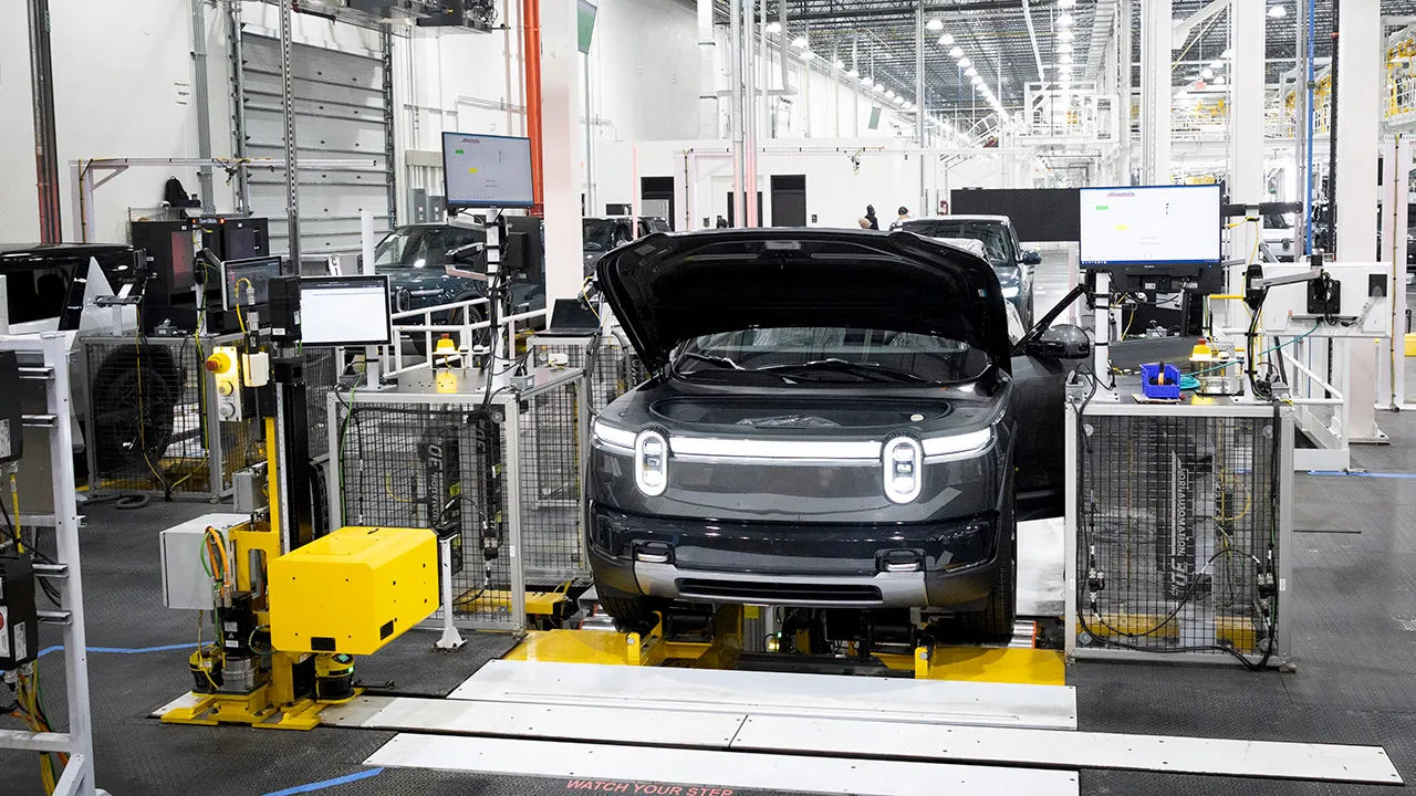 Rivian lays off hundreds in service division as it restructures teams