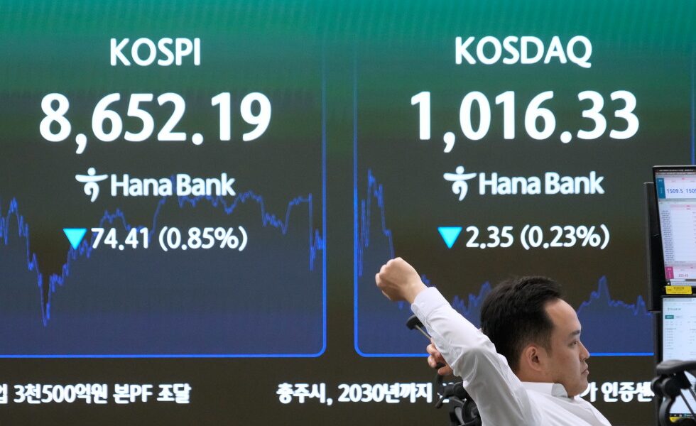 Asian shares are mixed and oil stays below $80 as world awaits details on US-Iran deal