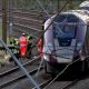 Emergency services respond to a collision of trains north of London that killed 1