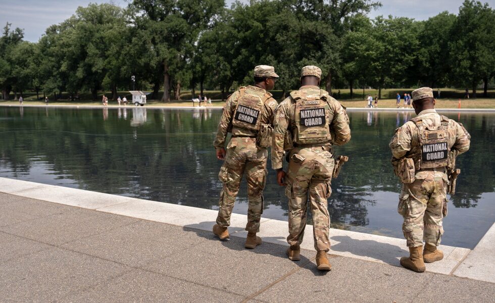 National Guard and US Park Police patrol Reflecting Pool as coating peels