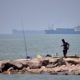 Iran targets Bahrain as a tanker is hit in the Strait of Hormuz