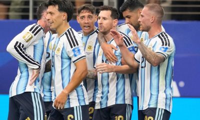Messi sets World Cup scoring record as defending champ Argentina moves on