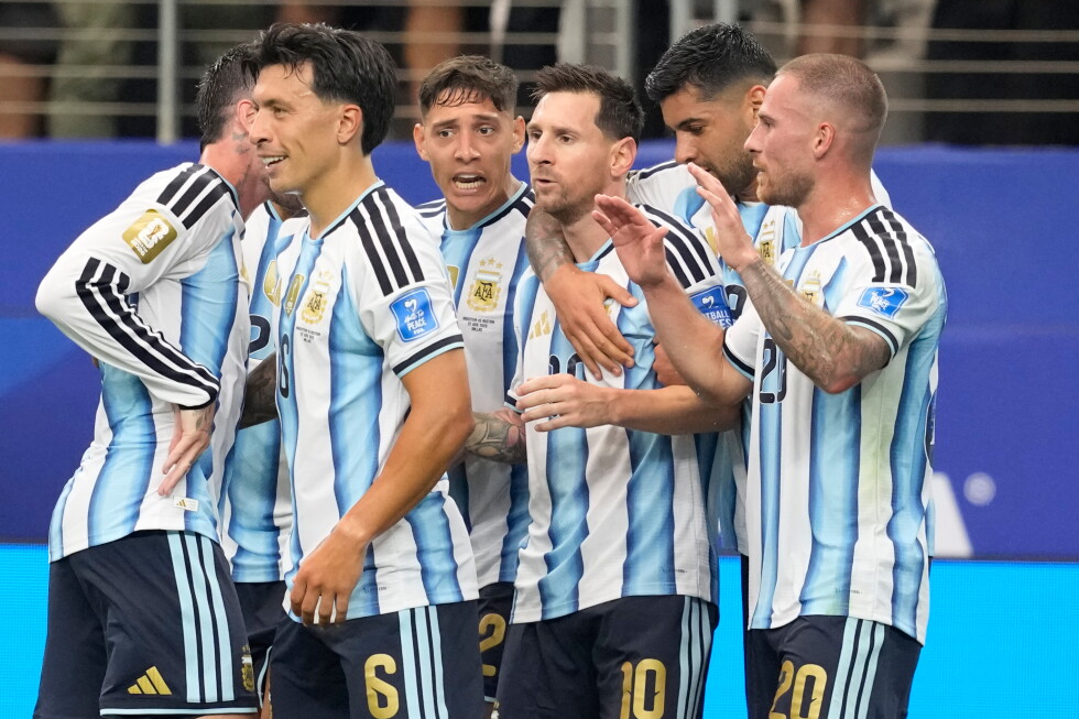 Messi sets World Cup scoring record as defending champ Argentina moves on