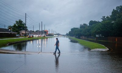 Heavy rain falls in Gulf states as Midwest cleans up from tornadoes