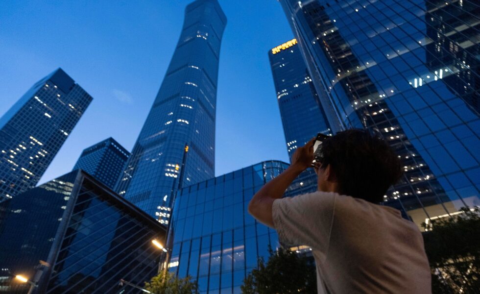 Beijing's tallest tower is damaged after small airplane reportedly crashed into it