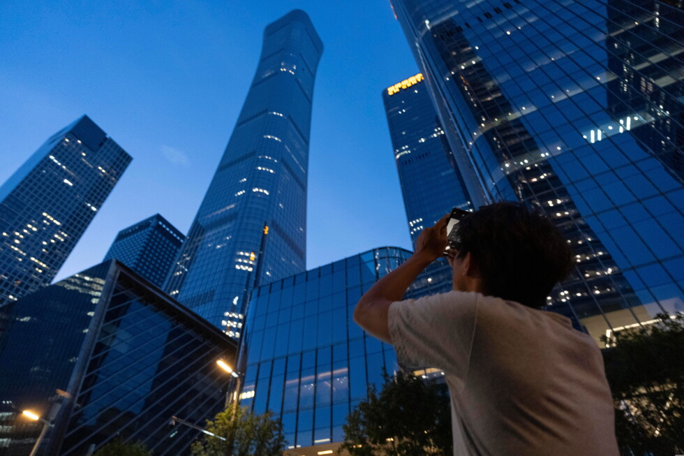 Beijing's tallest tower is damaged after small airplane reportedly crashed into it